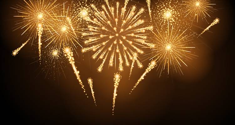Feux d'artifice dorés éclatants sur fond sombre.