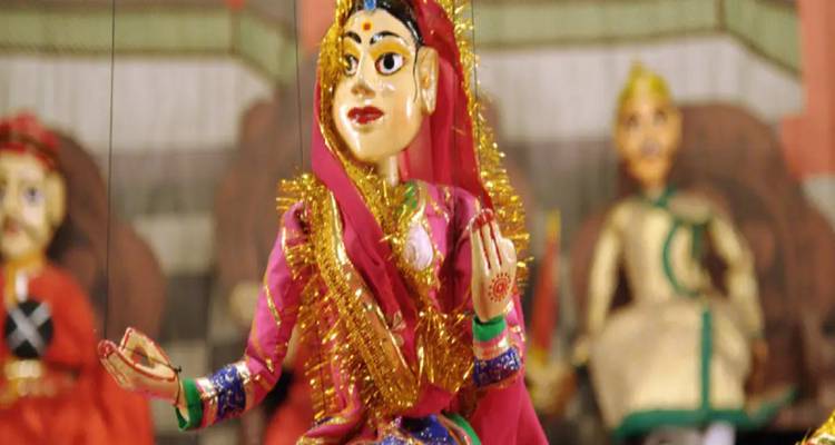 Colorful traditional puppet with an Indian cultural theme.