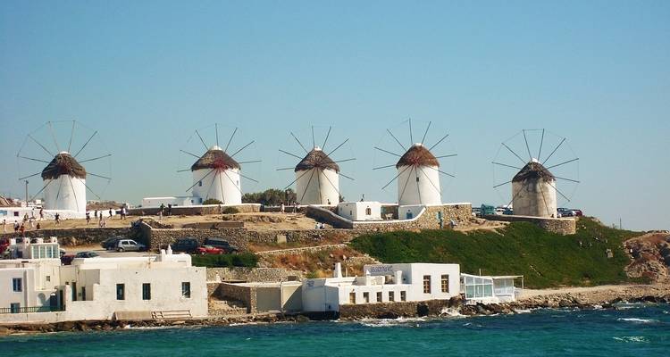 Windmills on a coastal hill in Mykonos.