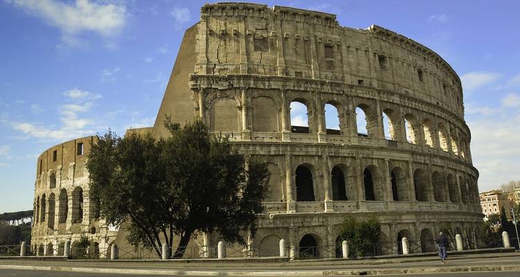 Side view of the iconic Colosseum in Rome.