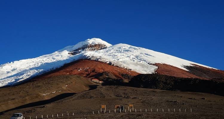Snow-capped mountains under a clear blue sky.