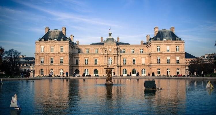 Luxembourg Palace building viewed across a pond.